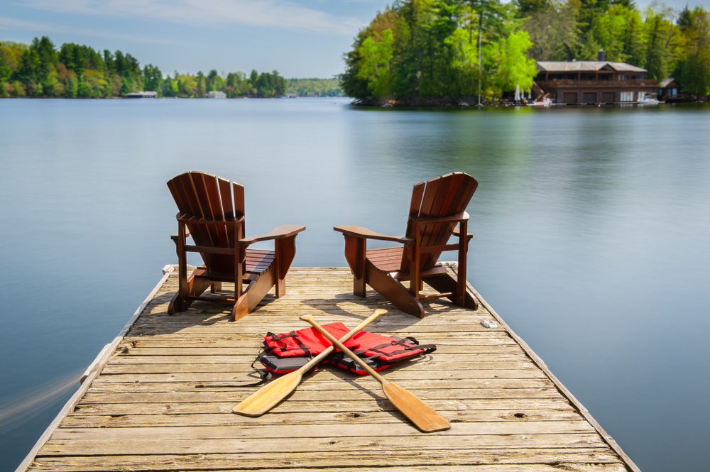 Muskoka chairs on cottage dock