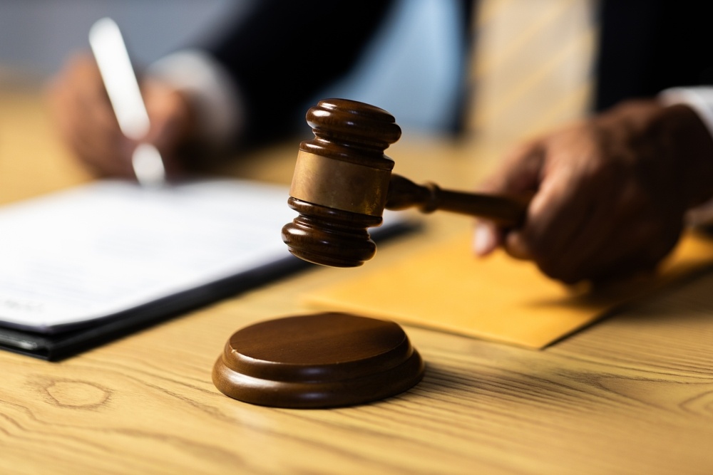 Male lawyer working at the desk in the office Justice and law, lawyer, court judge, concept.